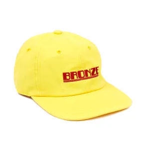 BRONZE 56K PLATE HAT YELLOW