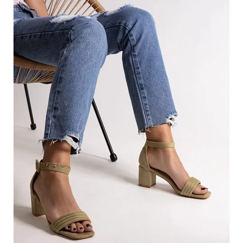 Johar's green low-heeled sandals